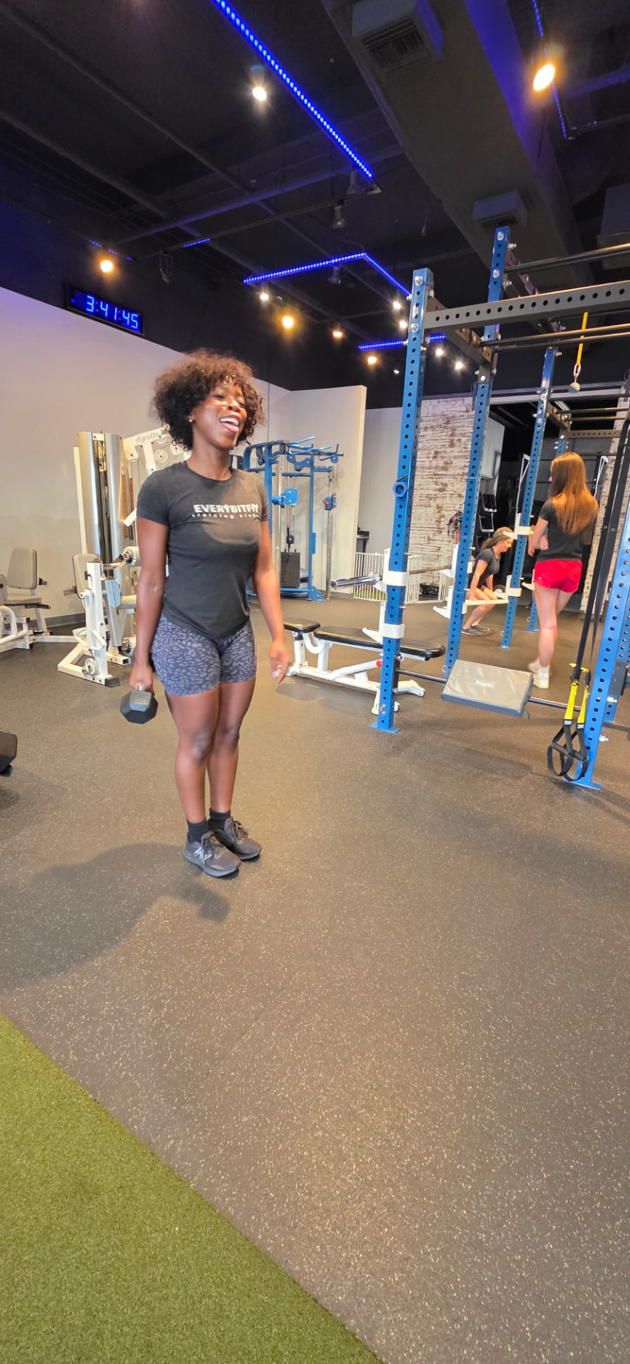 Female personal trainer coaching a strength session at Everybitfit in Scottsdale